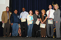 Photo of employees of the Crooked Creek Disaster Housing Team receiving their Honorable Mention