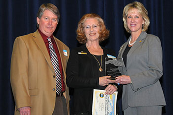 Photo of Sheila Baker receiving award