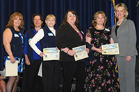 Photo of employees of the Staff Development and Training Team receiving their Honorable Mention