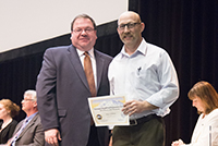 Photo of _______ accepting Exceptional Performance Honorable Mention on behalf of Stacey Oshima