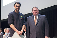 Photo of Tom Lesatz receiving Crisis Responder Honorable Mention